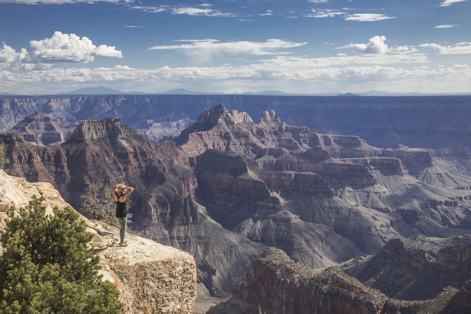 Woman looking out over the Grand Canyon